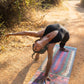 Person Doing Yoga On El Nino Magic Carpet Mat